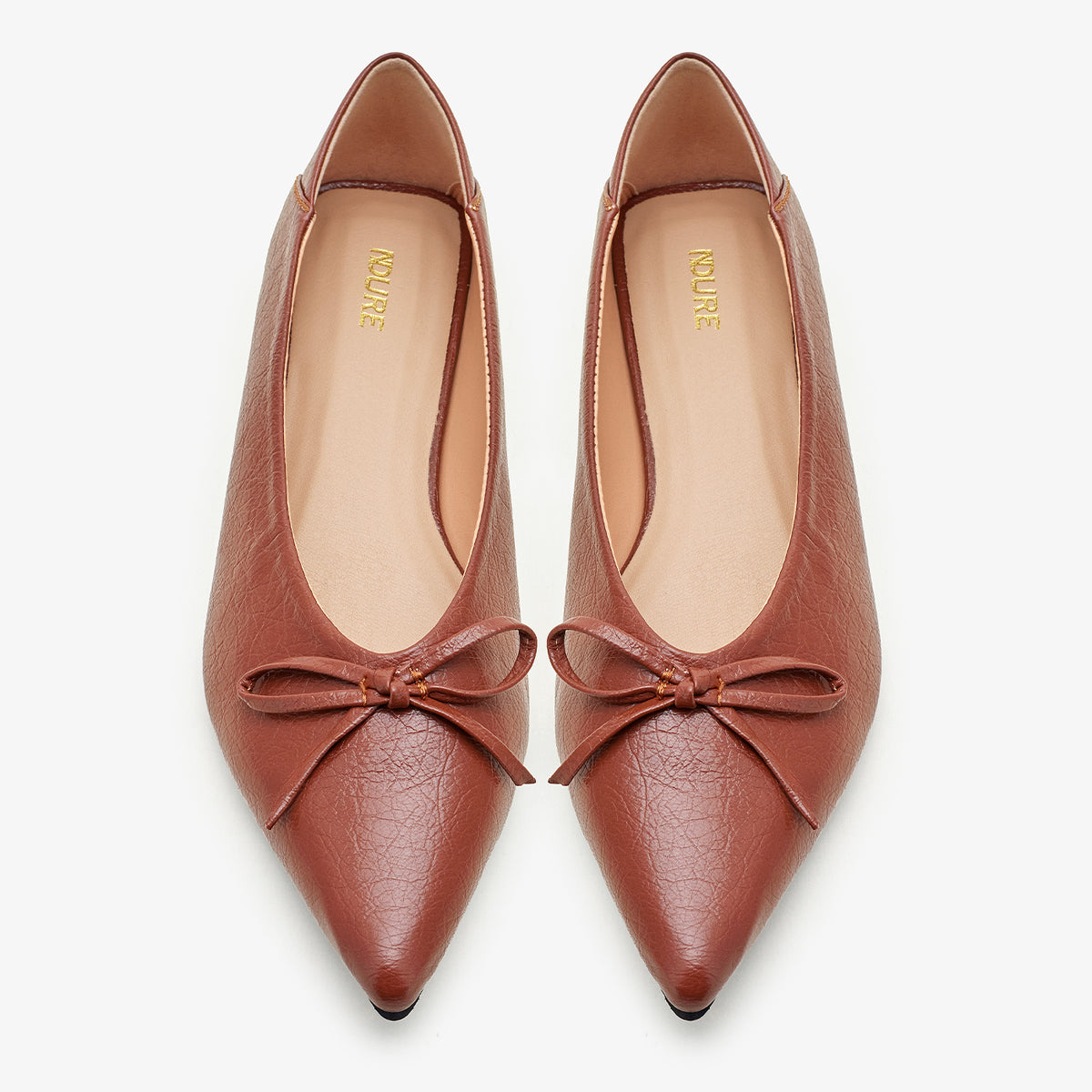 Women’s Pointed Toe Bow Pumps